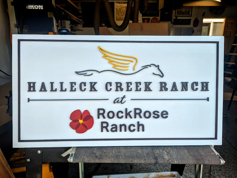 Dimensional wood sign for Halleck Creek Ranch.
